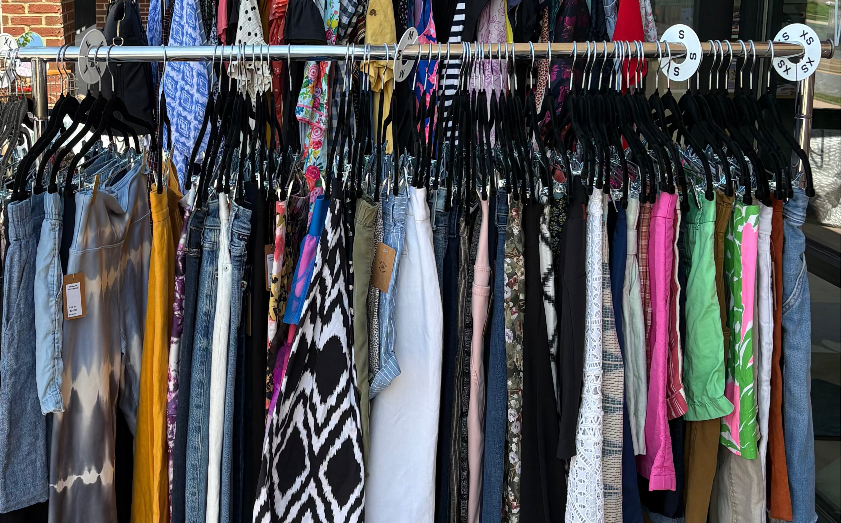 Rack of colorful clothes Hello Again Consignment Crozet Virginia
